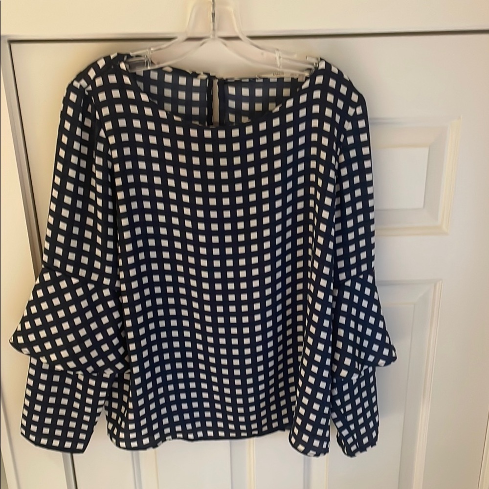 Airy and luxurious blue and white blouse with flared sleeves